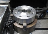 Machining a flange face on a fabricated hub at Pressform