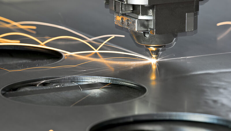 Close-up of a laser cut edge on steel plate at Pressform