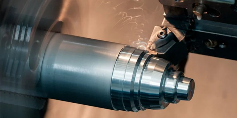 CNC machining a turned steel component at Pressform