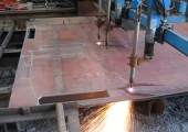 Steel plate being plasma cut into blanks before folding at Pressform