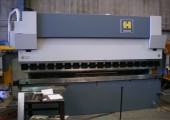 Laser cut steel blank being bent on a press brake at Pressform