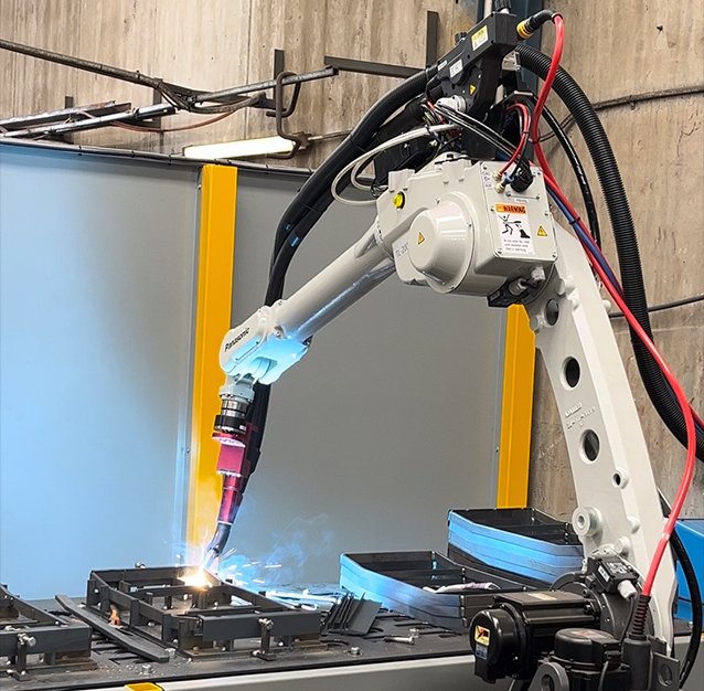 Panasonic robotic welding cell welding a jigged steel component at Pressform, Perth